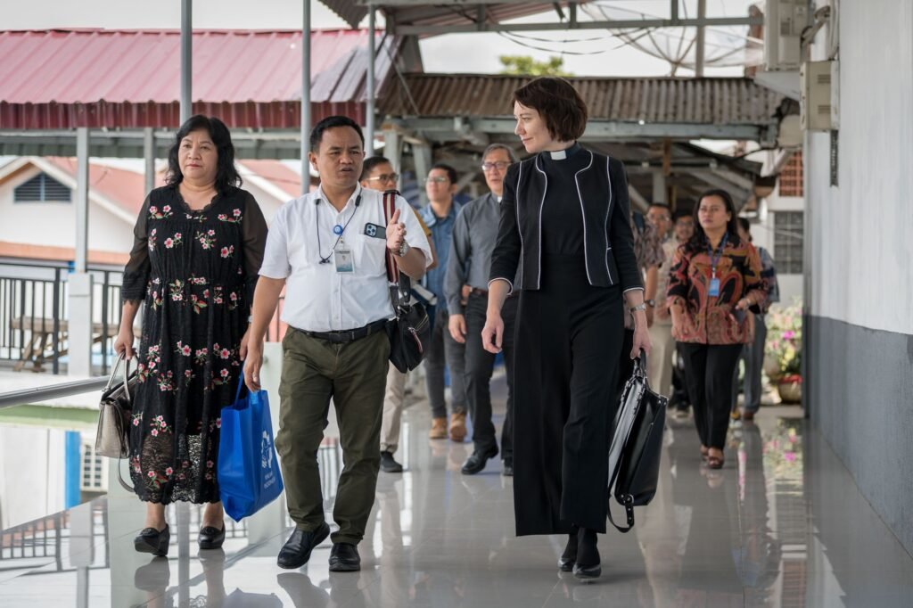 24 November 2023, Balige, Indonesia: Lutheran World Federation general secretary Rev. Dr Anne Burghardt (right) pictured in conversation with HKBP hospital director Dr Benny Sinaga (left) during a visit on 24 November. HKBP, the Protestant Christian Batak Church, is an LWF member church.